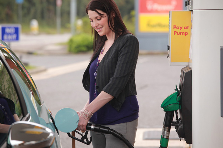 Motability Scheme customer filling up Motability Scheme car