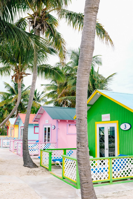 ine of colorful bungalows