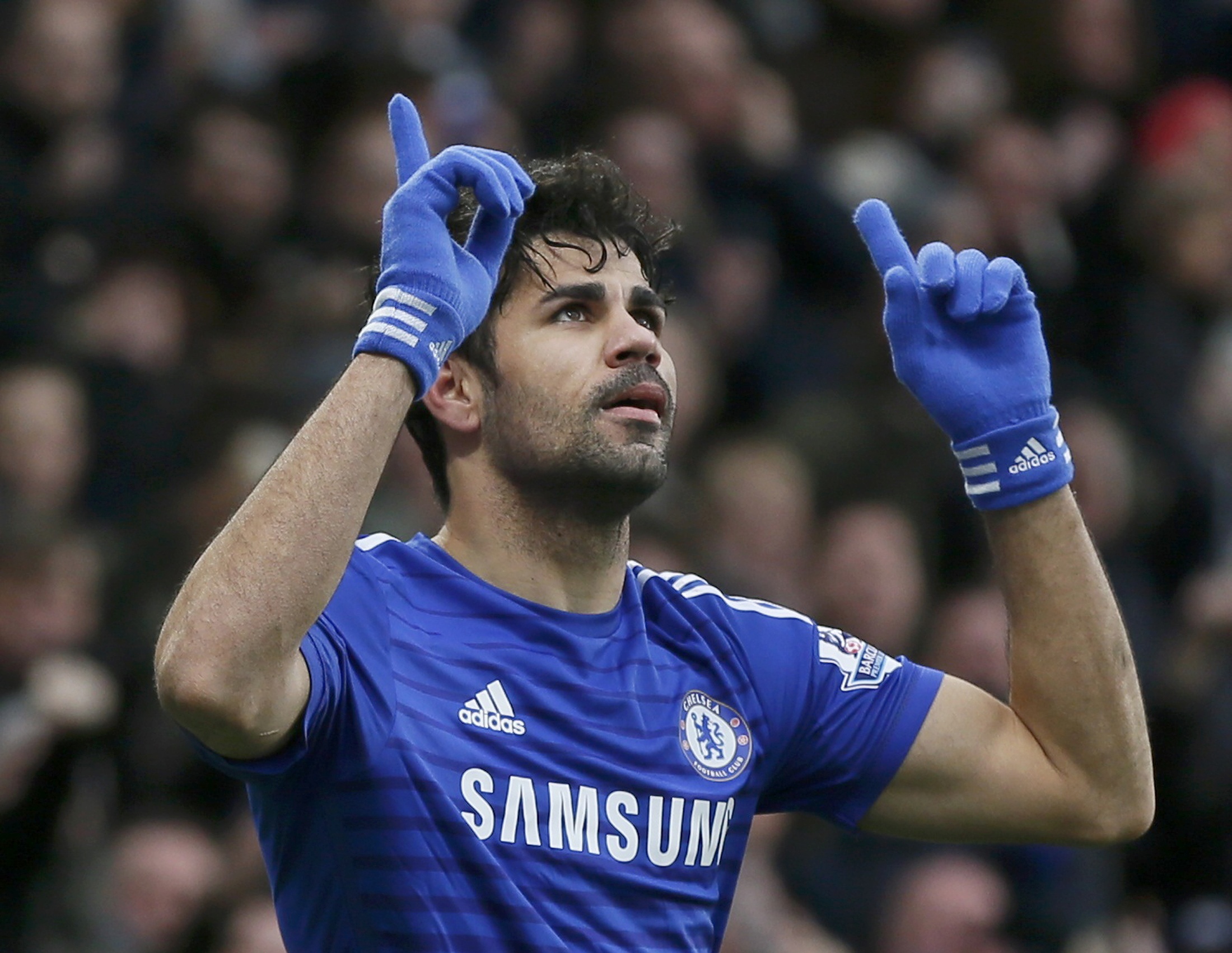 Chelsea's Diego Costa celebrates after scoring a goal against West Ham United during their English Premier League soccer match at Stamford Bridge in London